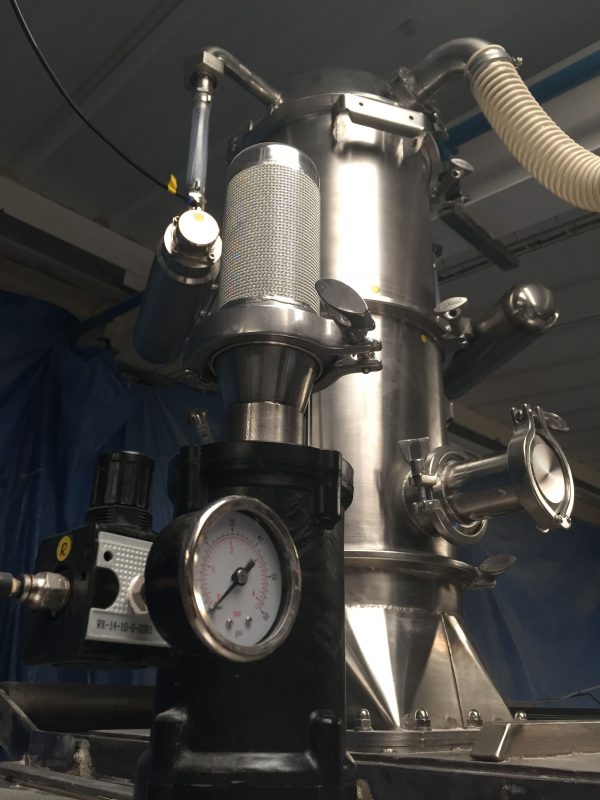 Complex vacuum system used for the blending of gluten free ingredients.